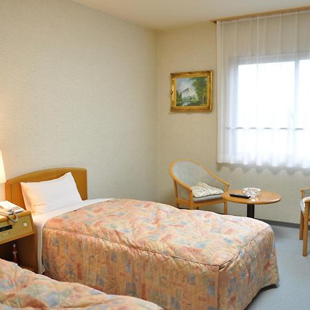 Hotel Kobushi No Yu Atsuma Habitación foto